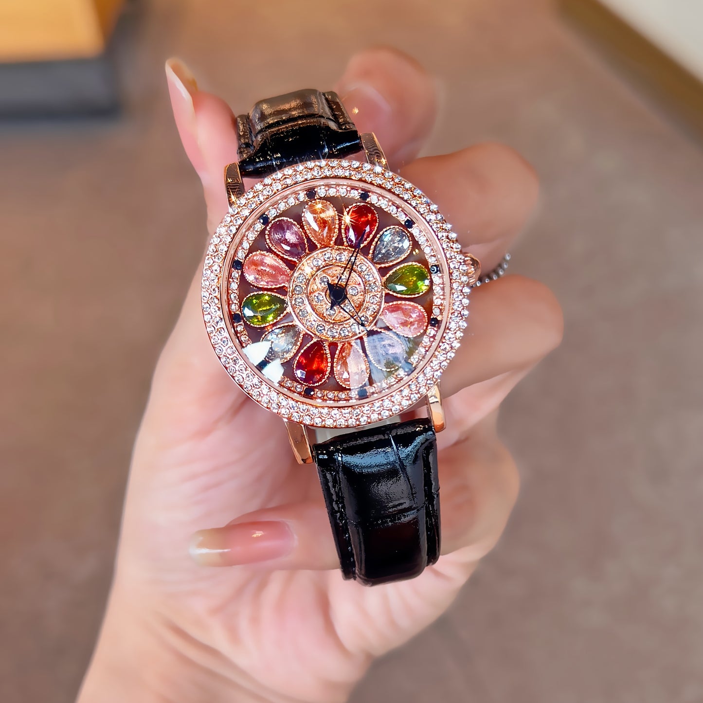 Stylish women's quartz wristwatch with colorful rhinestones, rotating dial, alloy case, and PU leather strap. Perfect for date night and everyday wear.