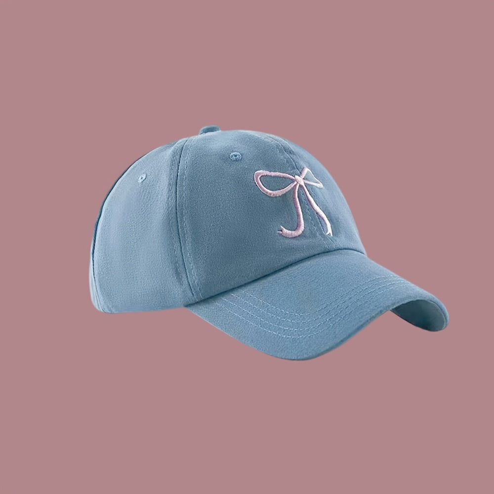 Adjustable bowknot baseball cap in sweet pink design, made of lightweight polyester. Comes in black, grey, apricot, and pink for casual wear.