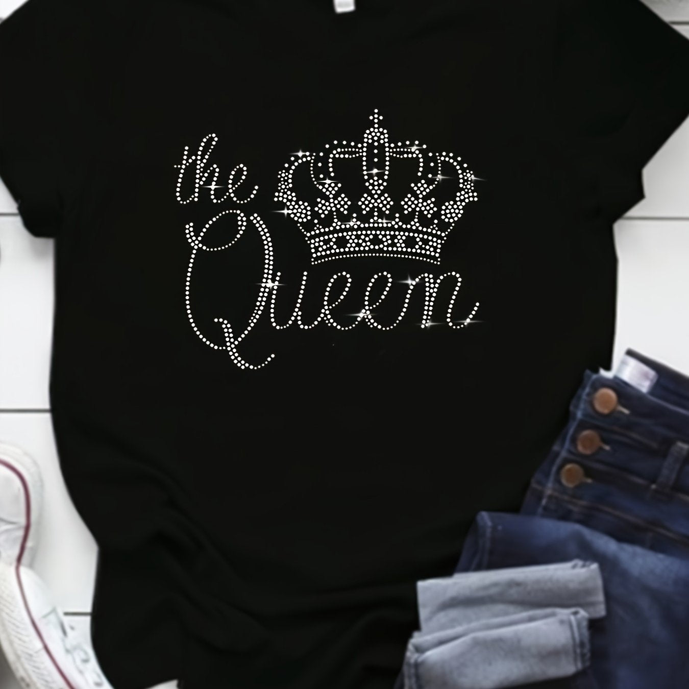 Plus size women's T-shirt with rhinestone crown design, crew neck, short sleeve, polyester knit fabric. From the spring/summer collection.