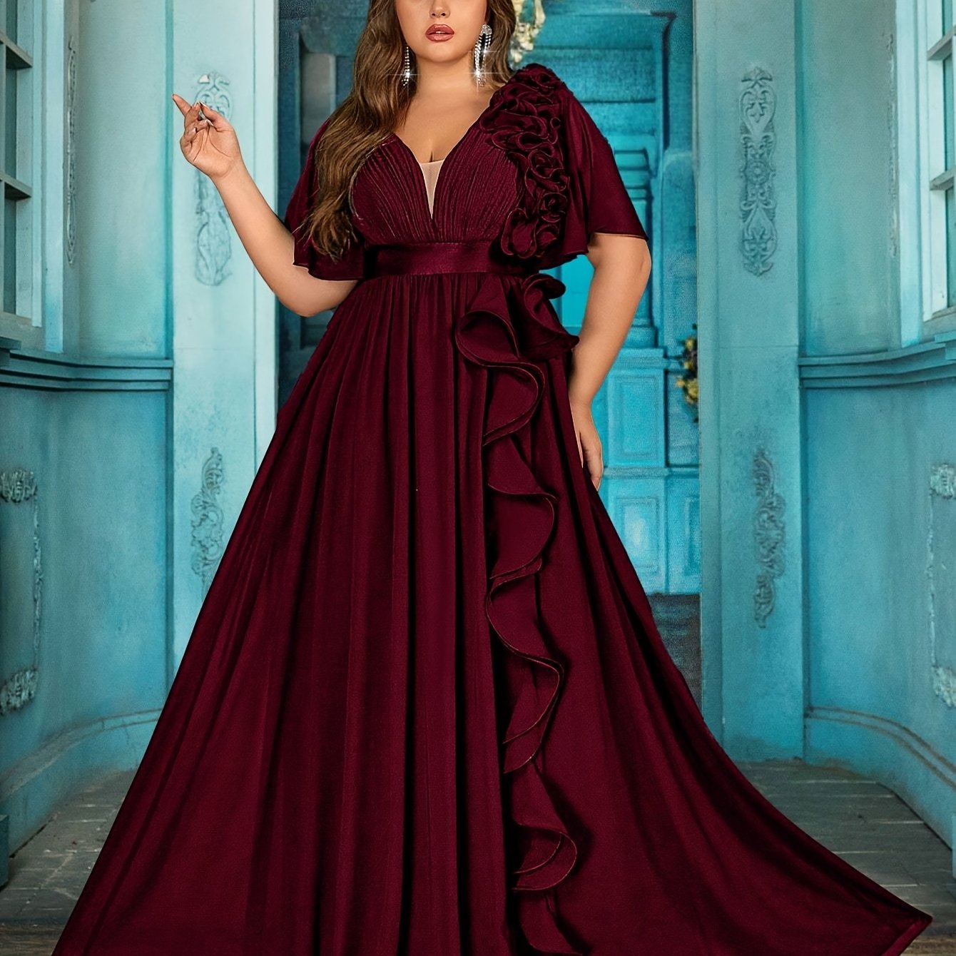 Stylish Plus Size Black Chiffon Evening Gown with V-Neck, 3D Floral Detail, Ruffled Hem, Short Sleeves, and High Waist. Perfect for weddings, graduations, and formal occasions.