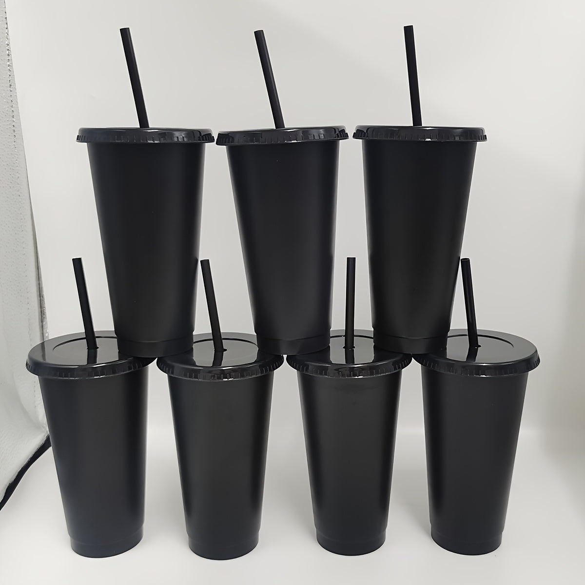 10 piece set of leak-proof 24oz reusable plastic tumblers with lids and straws. Ideal for various occasions like baseball games, parties, and holidays. Free of PVC. Great for Christmas, Halloween, Graduation, Juneteenth, and Labor Day.