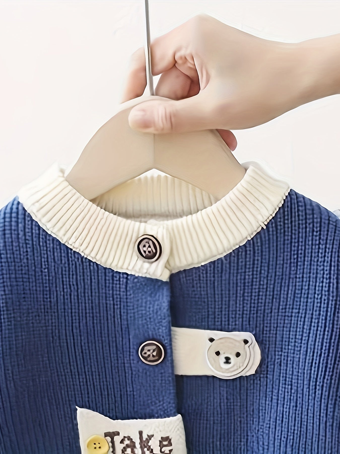 Cute boys' mustard yellow cardigan with bear patch. Cozy knit outerwear, perfect for fall/winter.