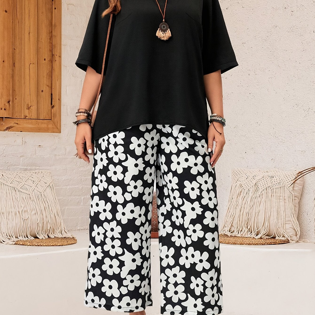 Plus size casual pants set with crew neck top and floral print pants for spring and summer. Women's plus size clothing.