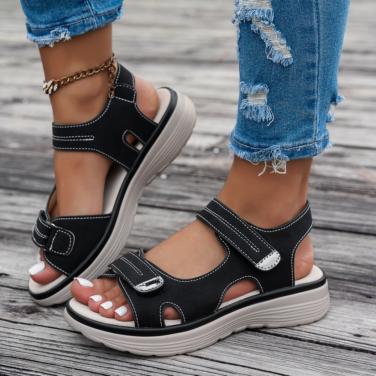 Women's black wedge sandals- breathable PU upper, open toe, ankle strap, hook-and-loop closure, solid color platform heel for beach wear.