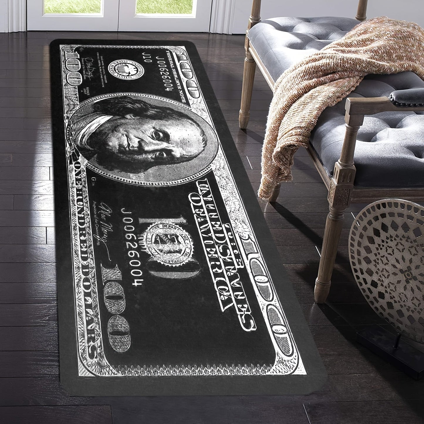 Transform your hallway with this stylish 1-piece Dollar Bill Runner Carpet in black and white. Perfect for adding a modern touch to your kitchen decor or bedroom, this non-skid rug is sure to enhance your home's ambiance.