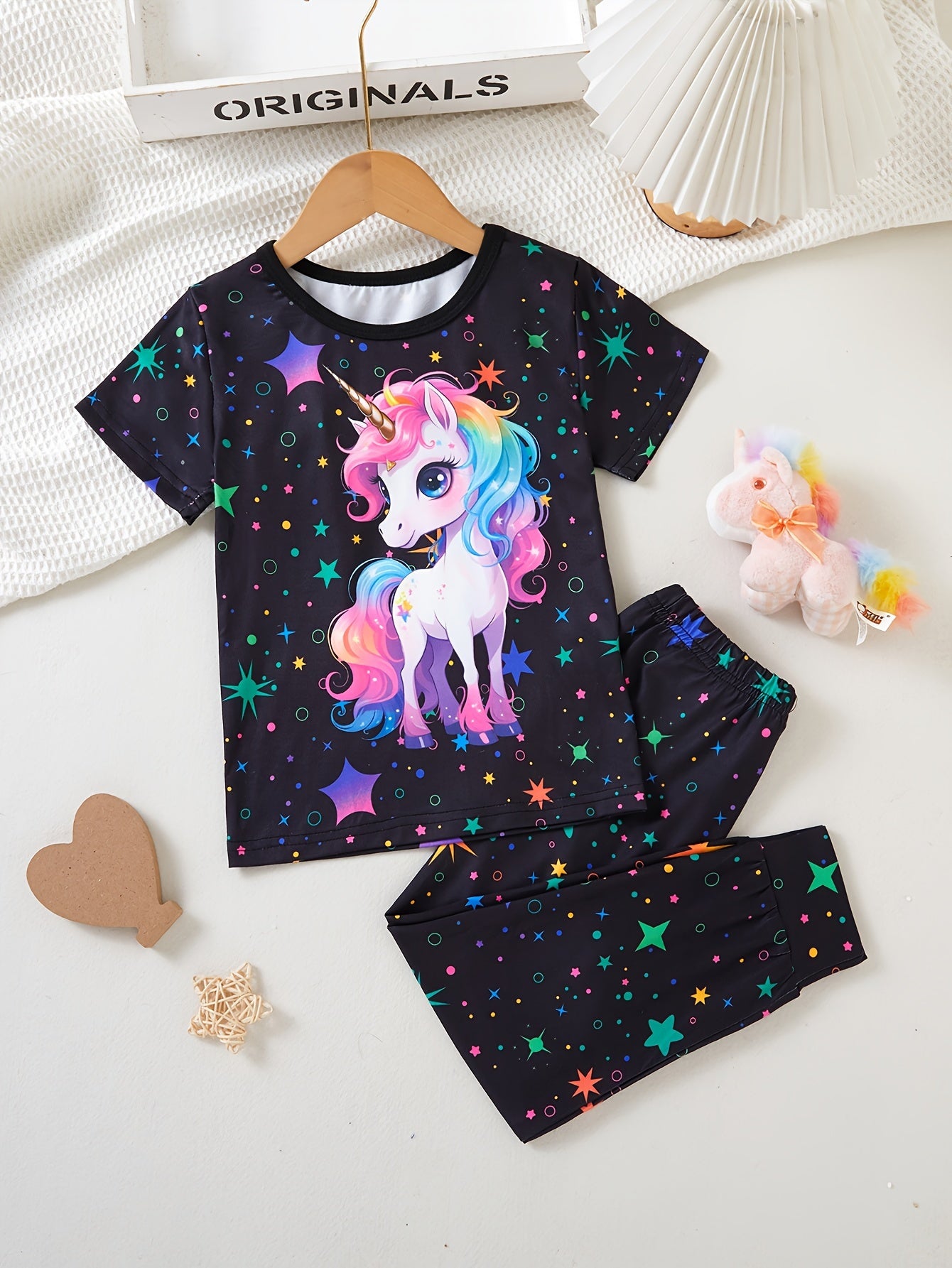 Girls' 2-piece set with cute unicorn hoodie and starry sky pants, perfect for outdoor wear with UV light illumination.