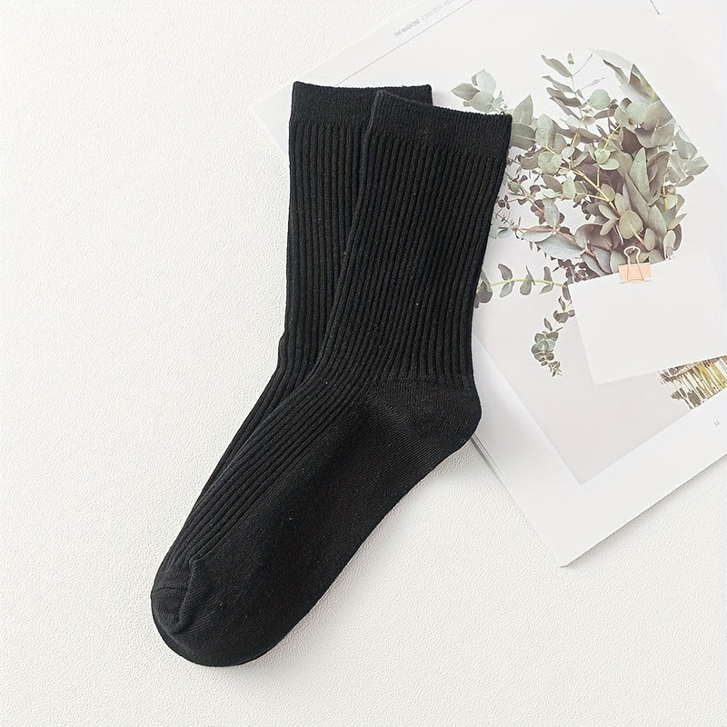 Men's solid color socks in a multi-pack of 2 or 5 pairs, breathable mid-calf sports socks suitable for all seasons. Trendy and boneless design.