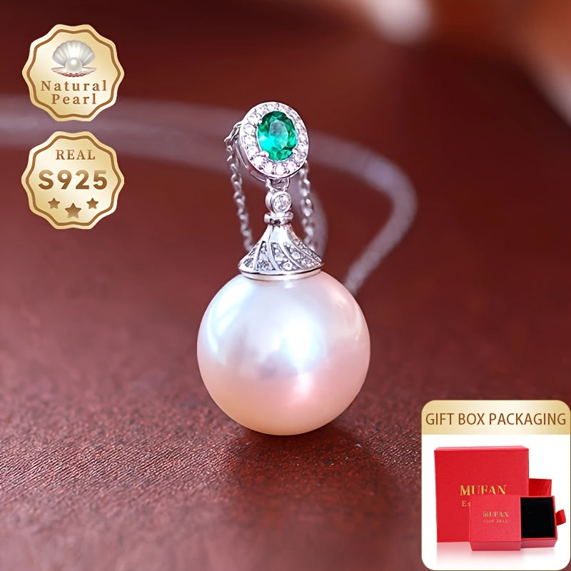 Give your loved one a special treat with this must-have gift box containing a stunning S925 silver pendant necklace featuring a 13-14mm round natural freshwater pearl. Each necklace is unique, with variations in natural pearls, shapes, and colors. The