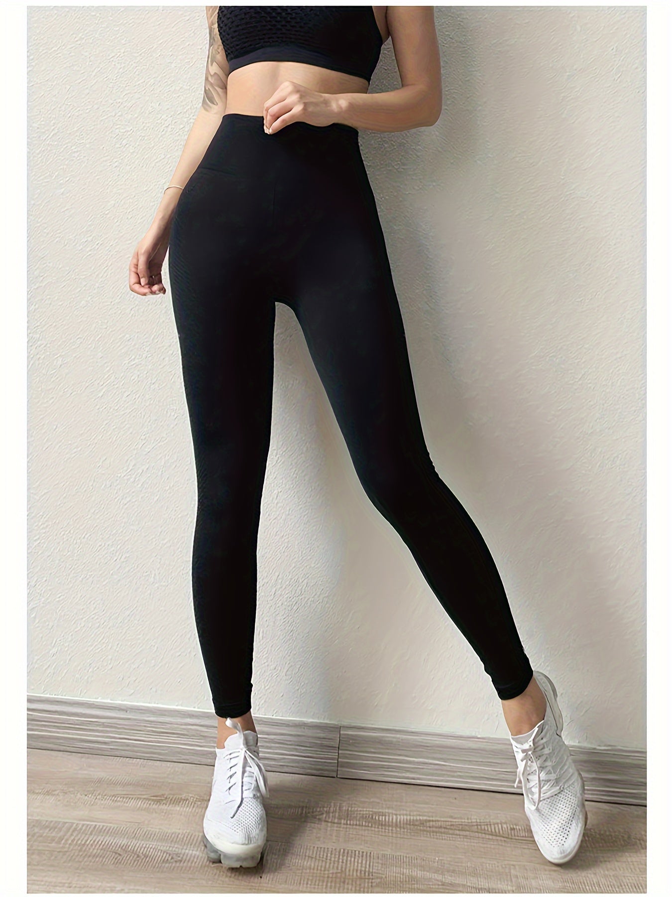 Stretchy high-waist leggings for women, ideal for yoga and fitness, machine washable.