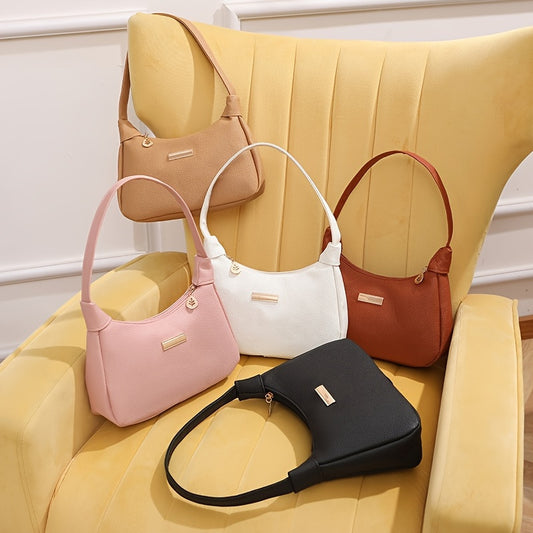 Women's shoulder bags in various colors with zipper closure and wristlet, made of synthetic leather and lined with polyester - versatile and stylish.