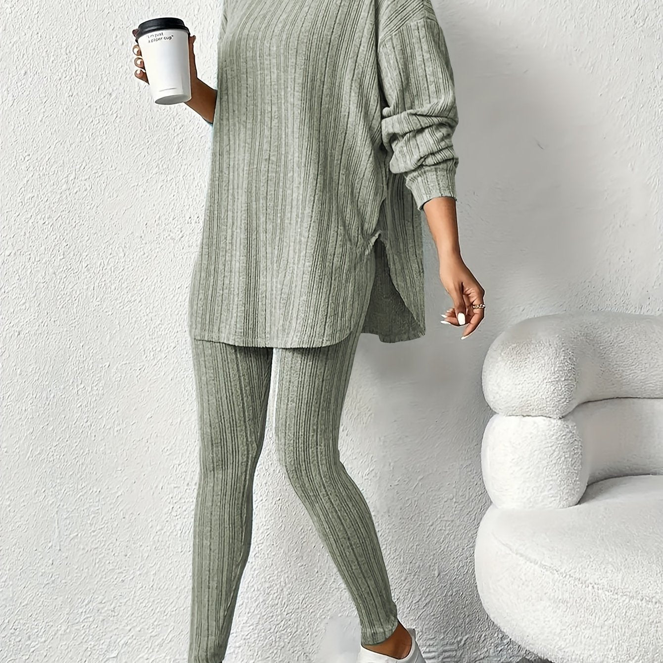 Women's cozy ribbed fleece lounge set featuring a long sleeve hoodie and stretchy leggings ideal for casual home wear in the fall/winter. Made of a comfortable polyester blend with a