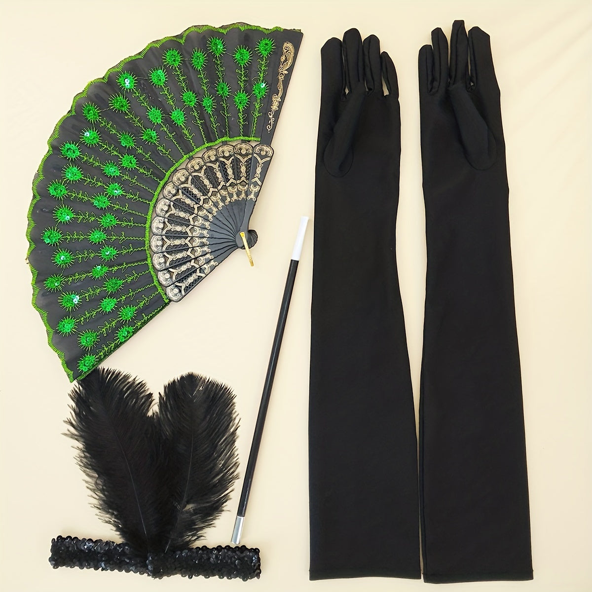 A collection of 1920s masquerade party accessories including gloves, faux feather hair clips, smoke tube fans, and other dress embellishments for women.