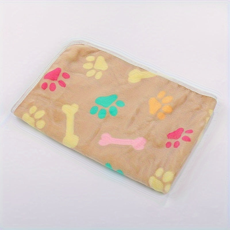 Soft and stain-resistant fleece pet blanket with bone pattern for all sizes of dogs and cats.