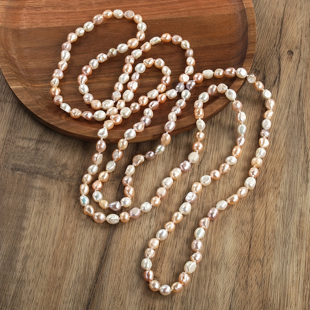 Stylish Bohemian Women's Freshwater Pearl Necklace, featuring Natural Irregular Beads in Orange Heart design. Ideal for both Daily Wear and Vacation. Measures 160cm in length with a charming White and Purple Mix. Exudes French Luxury.