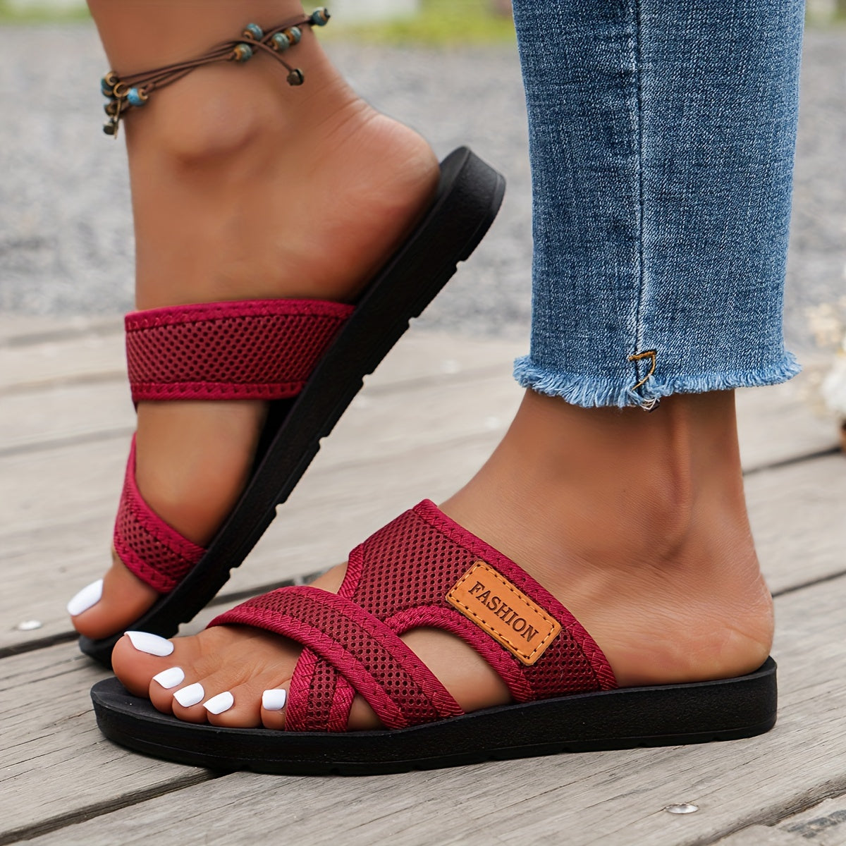 Breathable mesh slide sandals for women with crisscross straps, lightweight and comfortable. Available in Black/Brown or Red/Black. Suitable for casual indoor and outdoor wear.