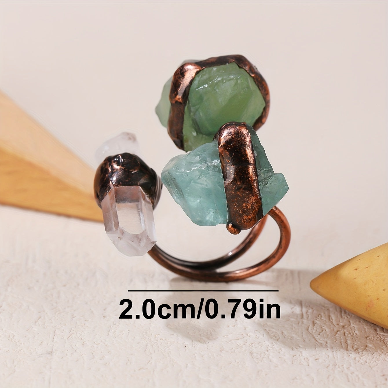 Handmade from natural crystals, this one-of-a-kind ring showcases a beautiful mix of light and dark colors, random shapes, and unique fluff and sand cracks. These characteristics are not flaws, but rather natural phenomena that make each piece truly