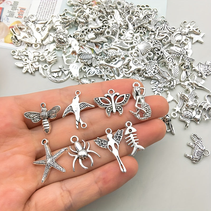 100 pieces of metal mixed jewelry making charms, vintage animal charms for DIY necklace making.