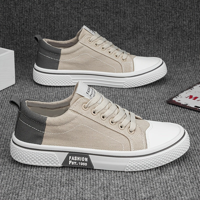 Stylish men's canvas sneakers with two-tone design and breathable fabric lining, ideal for casual wear.