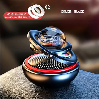 Solar rotating car aroma ornaments with solid perfume tablets for car interior decoration.