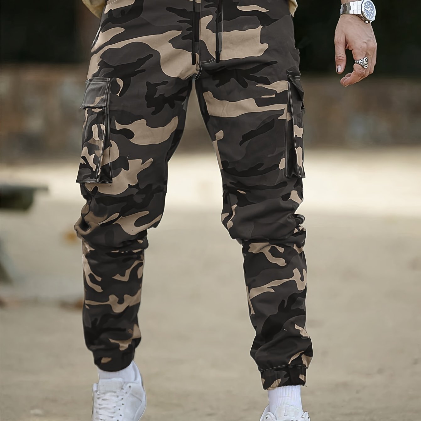 Men's Cotton cargo pants in camouflage print with flap pockets and loose fit, suitable for casual or outdoor wear in a streetwear hip hop style.