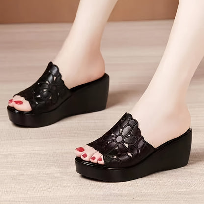 Women's floral pattern slide sandals with platform sole and soft wedge for comfortable walking.