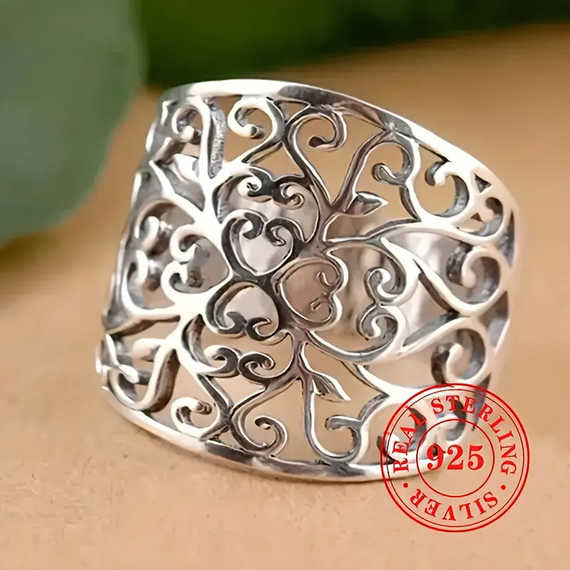 Vintage Bohemian Style 925 Sterling Silver Wide Band Ring featuring a stunning large openwork leaf design, perfect for weddings and gifts. This elegant piece showcases a neutral hollow vine pattern that is both timeless and versatile.