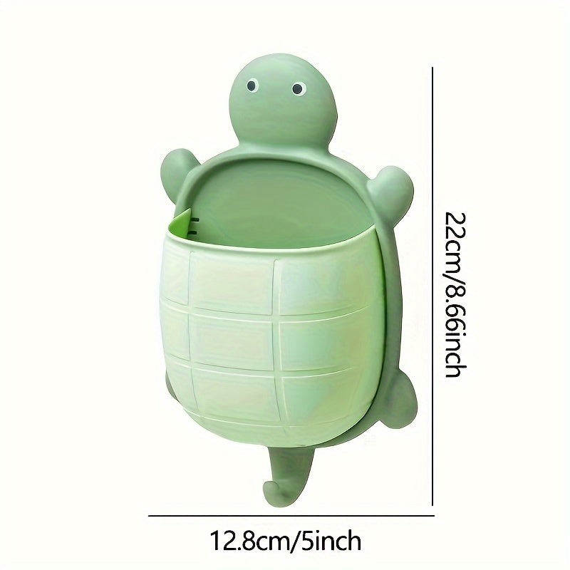 Turtle-shaped wall-mounted remote control holder with self-adhesive storage for home bathroom makeup organization.