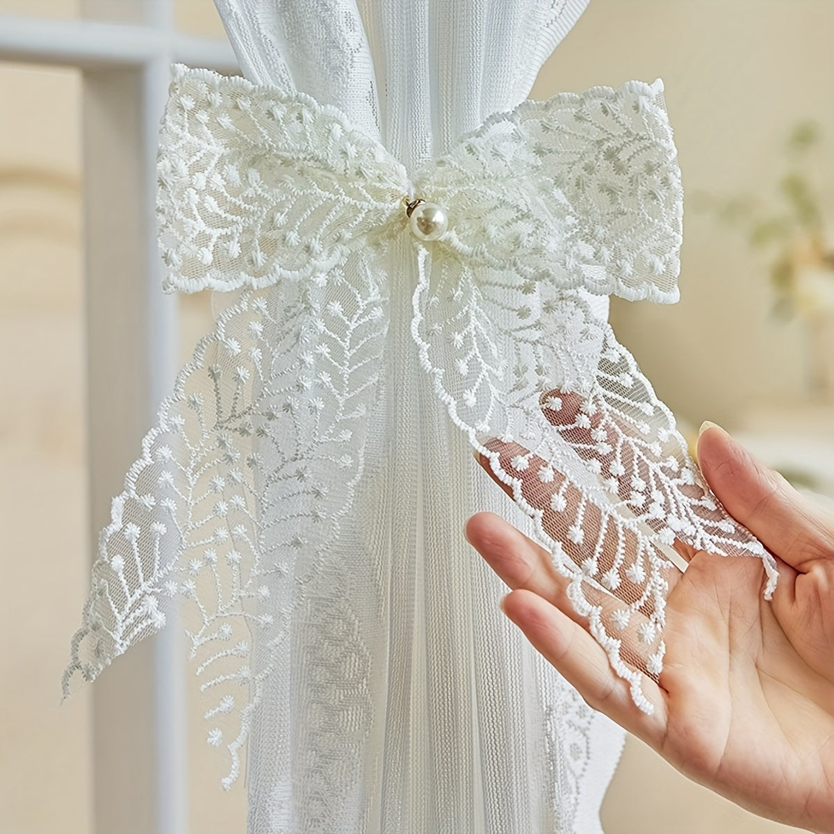 1 Pair of Bow Lace Pearl Curtain Tiebacks - A chic and versatile way to add a touch of elegance to your curtains. These French lace pearl ribbon tiebacks are perfect for use in the bedroom, living room, study, coffee shop, or any other room in your home