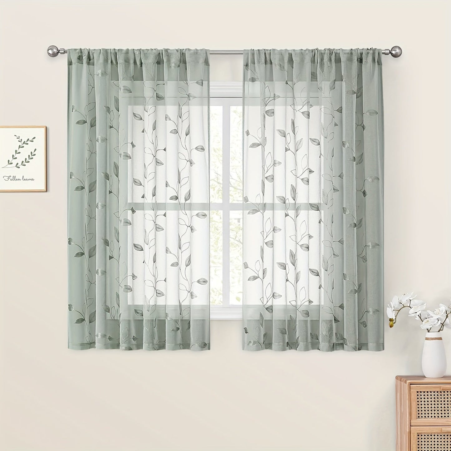 Two pieces of garden-style sheer curtains with an embroidered leaf pattern, featuring a rod pocket design. Made of polyester, these drapes are perfect for bedrooms, living rooms, and kitchens. They are machine washable and suitable for all seasons