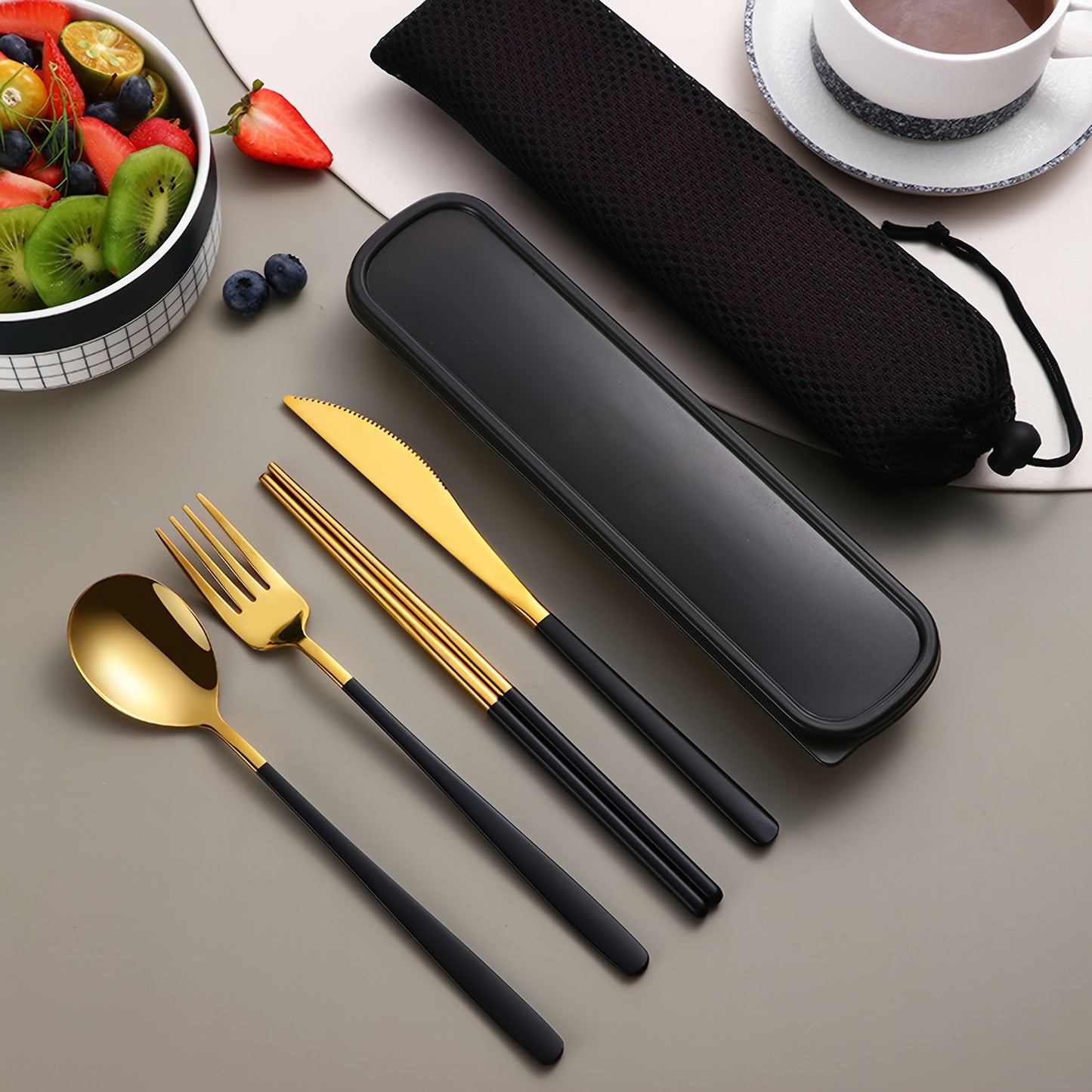 Stainless steel cutlery set includes knife, fork, spoon, and chopsticks in portable case for picnics, camping, lunches, and gatherings.