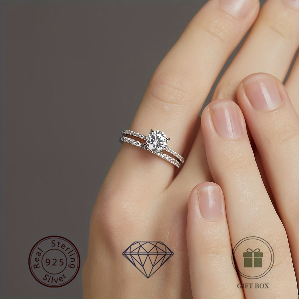 WES Elegant & Sexy Double Band Moissanite Wedding Ring featuring a 1CT stone. Crafted with 925 Sterling Silver and plated with 14K Gold, this stunning ring can also be worn as a removable engagement ring. A timeless and classic fashion piece, perfect for