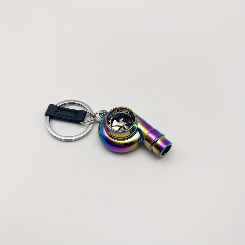 Keychain featuring a rotating turbine design, perfect for car enthusiasts. This creative accessory also doubles as a key holder and includes a turbine whistle feature. Ideal as a unique gift option.