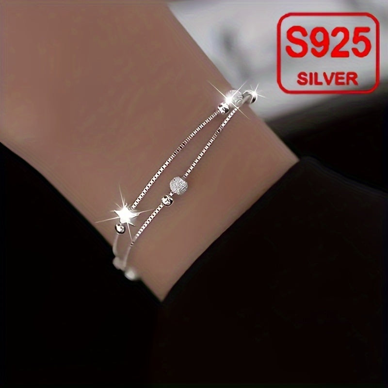 Introducing a stylish and versatile ladies' bracelet - the Double-layer Star Bracelet, a perfect accessory for the summer beach. Made of hypoallergenic S925 silver, this 2.9g piece is ideal for gifting, daily wear, wedding banquets, beach vacations, and