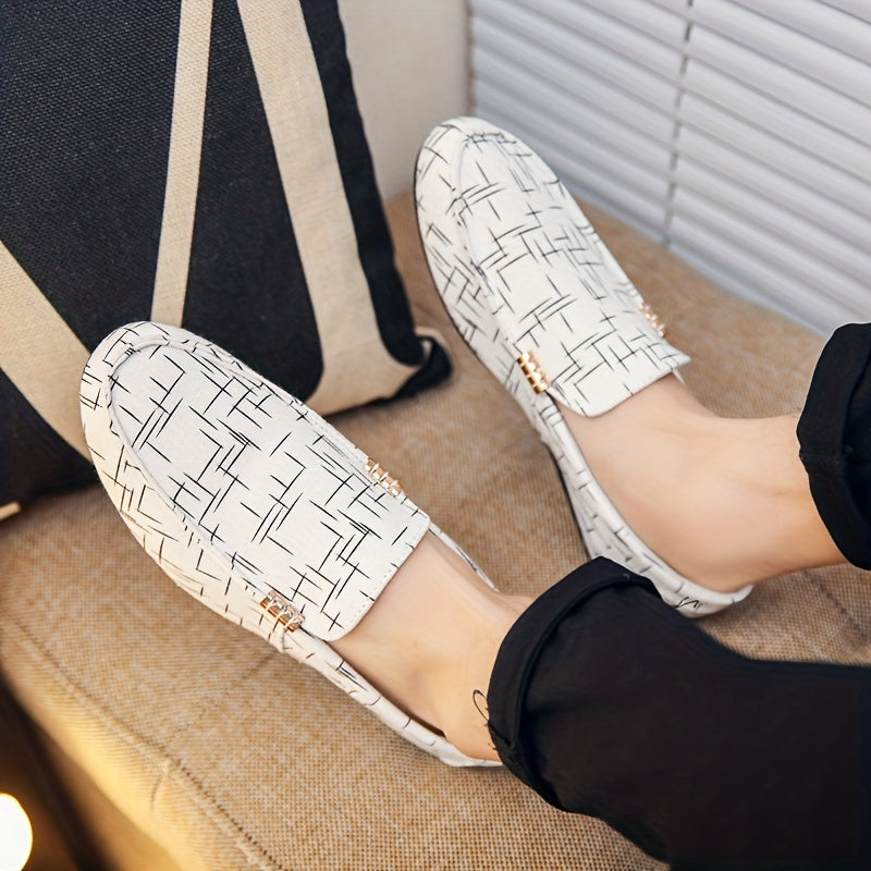 Men's slip-on loafers with stylish black and white geometric pattern, breathable mesh upper, rubber sole, and round toe. Perfect for outdoor wear in all seasons. Durable and comfortable