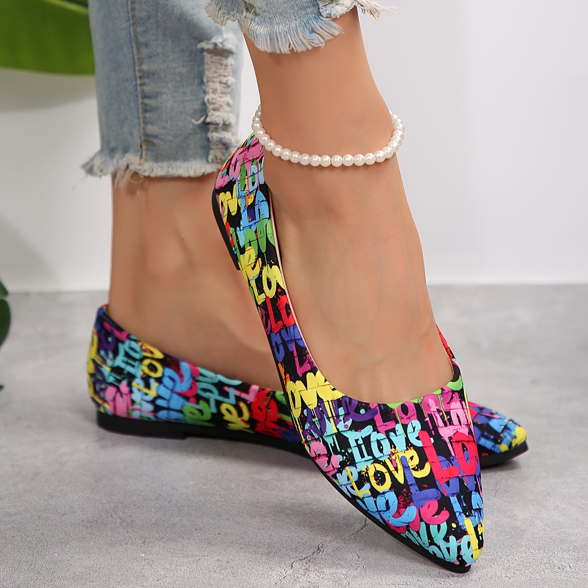 Floral flat shoes with pointed toe and soft sole for daily wear.