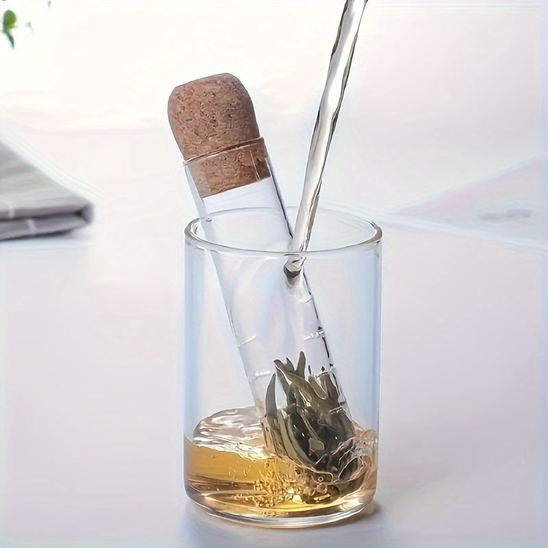 This innovative glass tea steeping device features a cork plug and a flower tea test tube, made from high borosilicate glass for portability. Ideal for steeping Pu'er, black, green, and fruit health teas, it fits most cups and mugs. Transparent tea