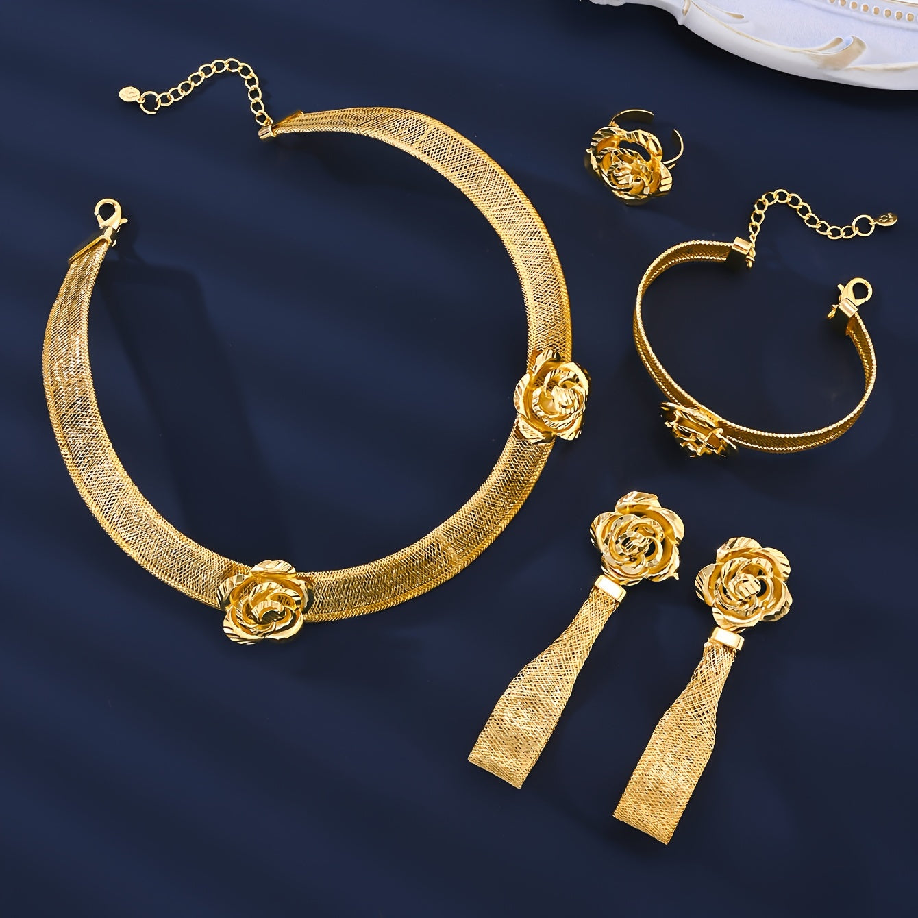 Upgrade your wardrobe with the MEIZ Vintage Classic Jewelry Set. This set includes a stunning 18K Golden Plated Copper Necklace, Bracelet, Ring, and Earrings designed in an elegant handwoven Middle Eastern style. Perfect for daily wear or as a special