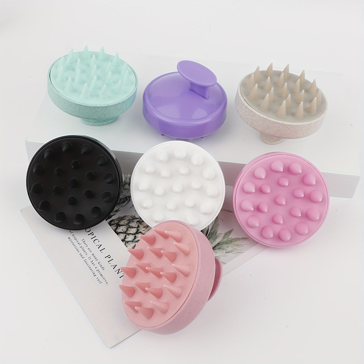 Silicone hair washing brush with plastic massage comb for hair washing and hairdressing.