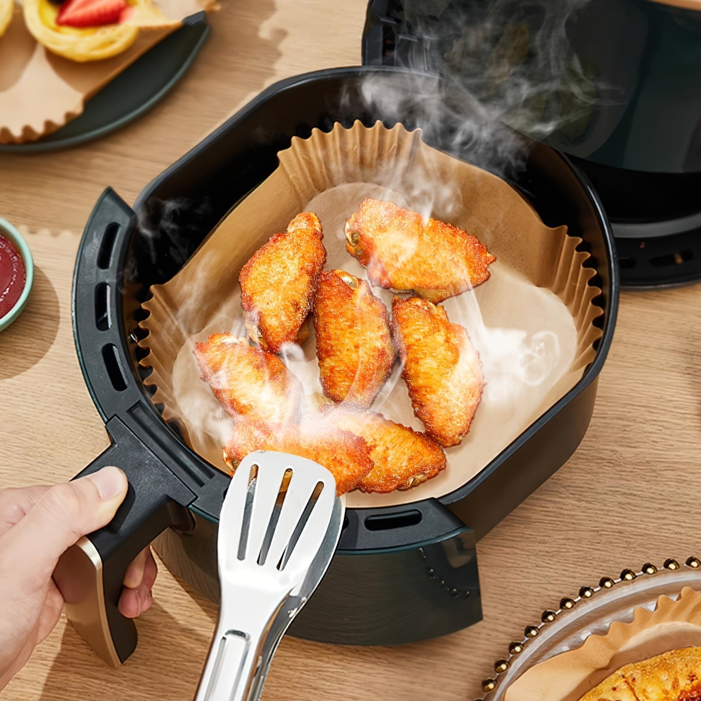 Air Fryer Liner Squares - Non-stick silicone that is easy to clean, space-saving, and safe for air fryer ovens. These disposable paper bowls are essential kitchen baking supplies and perfect for holiday party gatherings. Available in packs of 50 or 100.