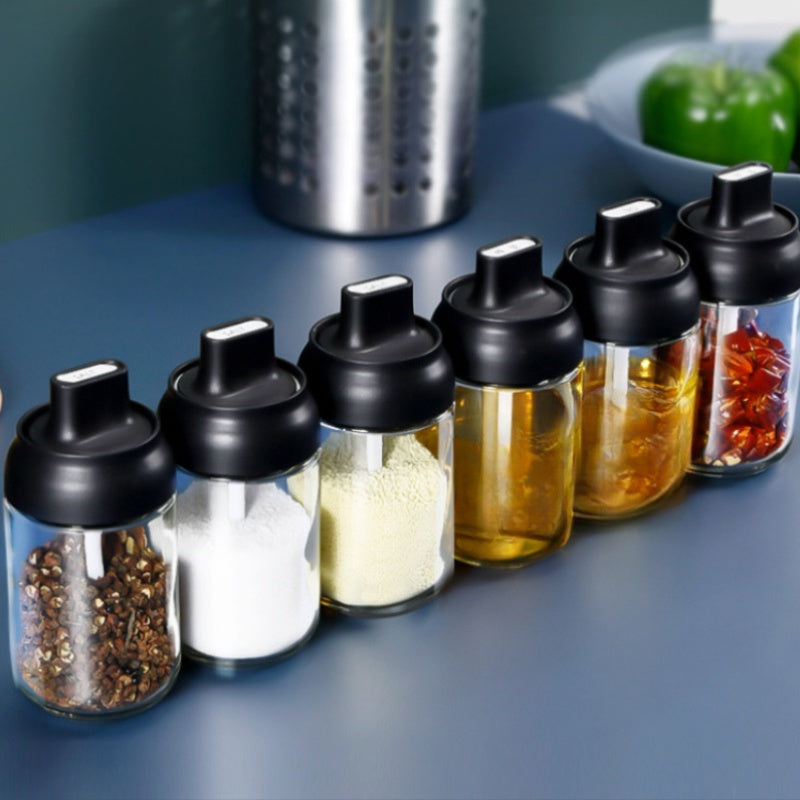 Lead-free glass condiment container with an airtight lid featuring an integrated spoon, keeps moisture out and requires no electricity. Includes a kitchen organizer for home use.