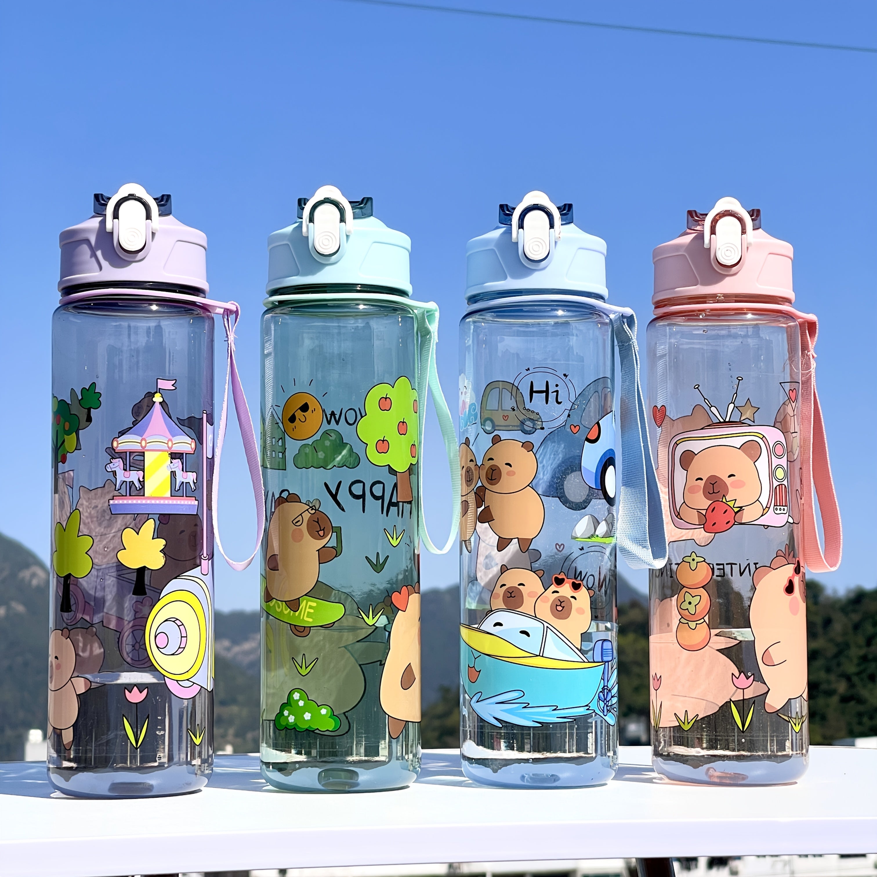 Adorable large sports water bottle with whimsical designs. Durable and portable, perfect for outdoor activities.