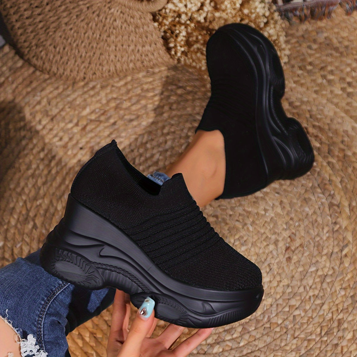 Women's slip-on sneakers with striped design, lightweight knit material, and thick platform sole for year-round wear.