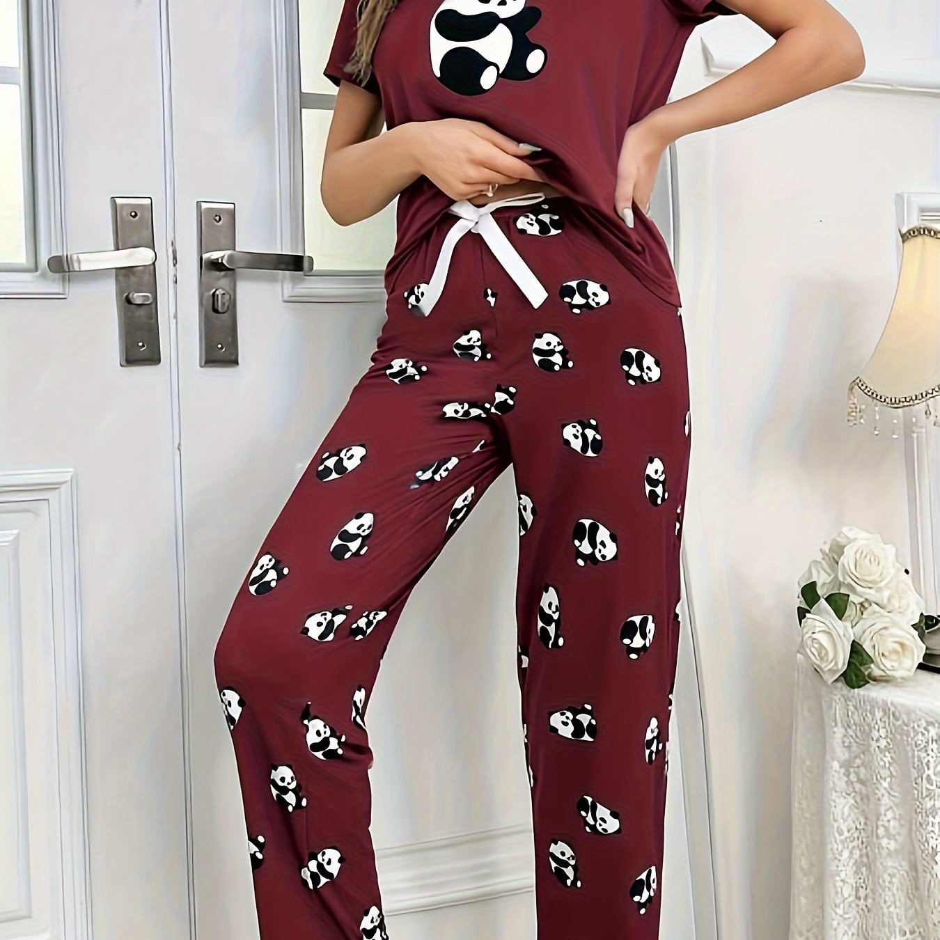 Women's cute panda print pajama set in dark gray, made of soft polyester and elastane blend. Features short sleeve crew neck top and long pants. Machine washable.