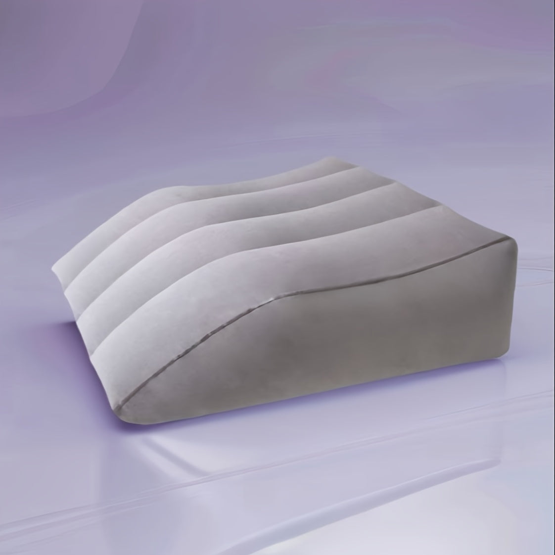 Elevate your legs with the Inflatable Leg Elevation Pillow to improve circulation and reduce swelling. This pillow is stain-resistant, with a medium soft firmness and non-textile cover. Ideal for post-surgery recovery, knee, and back pain relief. Spot