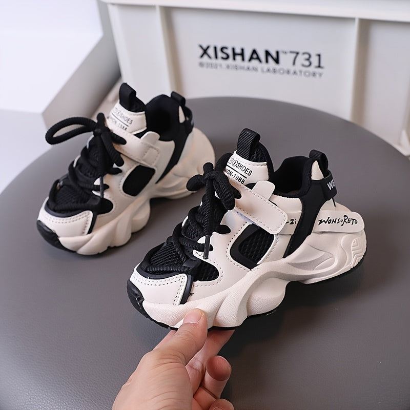 Durable slip-resistant baby boys' sneakers for casual wear in spring and fall.