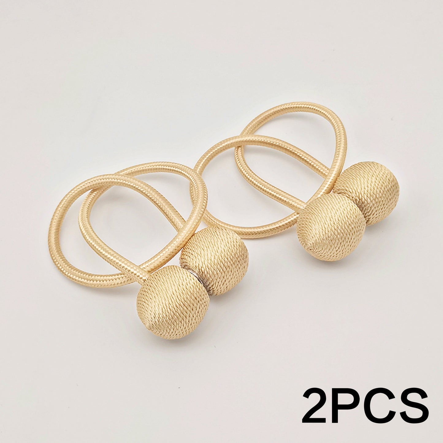 Get your hands on a set of two Classic Style Magnetic Curtain Tiebacks. These tiebacks are designed to be durable and easy to install without any drilling required. Made from polyester twisted rope, they feature a strong magnetic hold to secure your