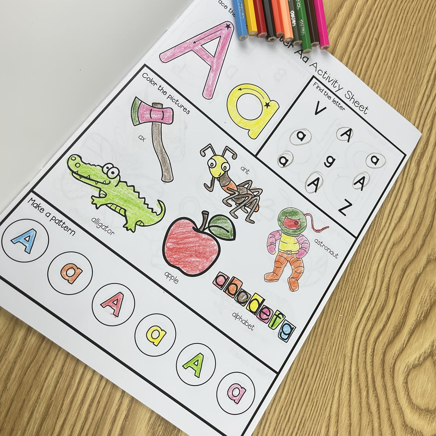 A part of an interactive alphabet book series with word practice sheets for each letter.