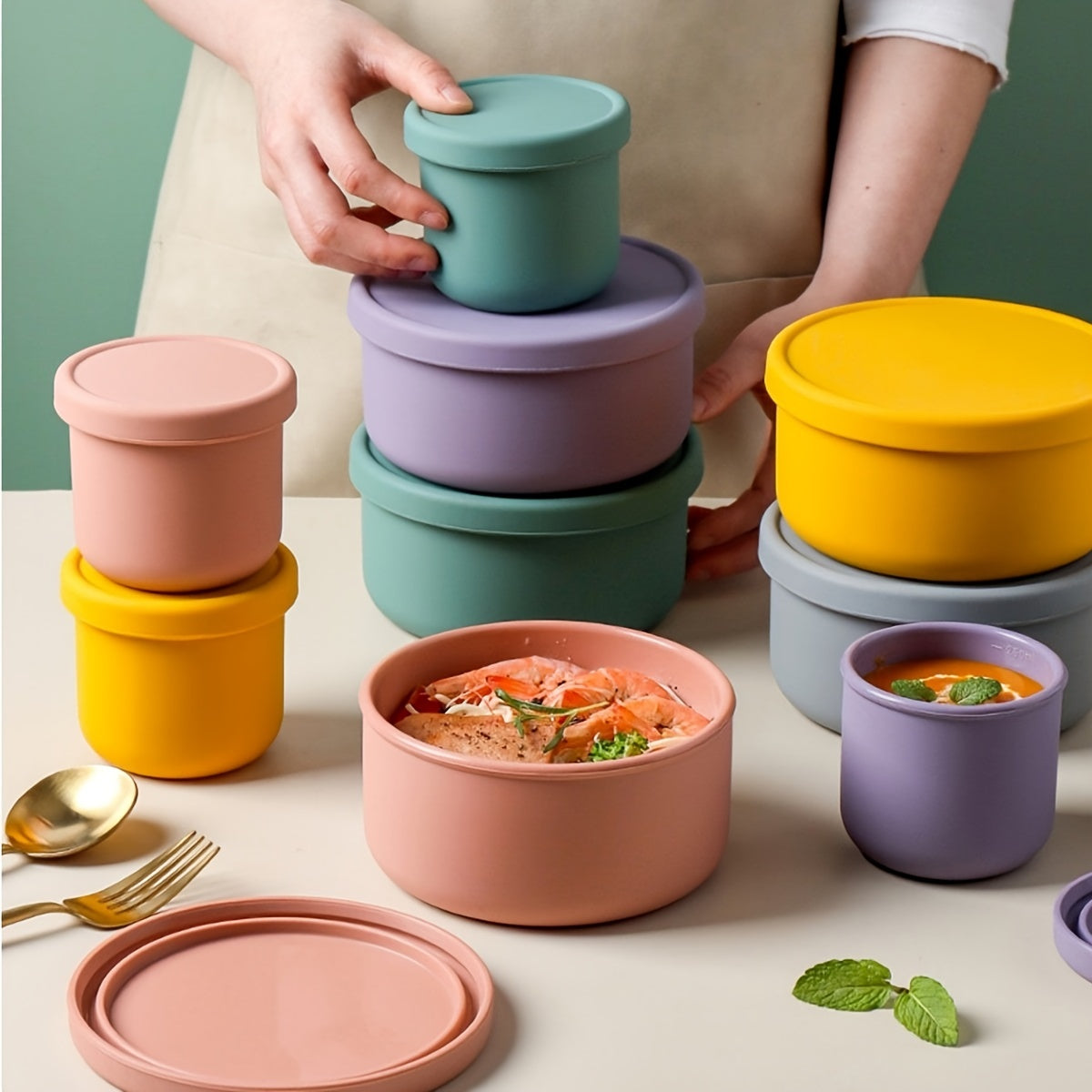 Multi-functional Storage Container made of Silicone - Does not contain BPA, can be used in the Microwave and Freezer. Ideal for storing Fruits, Vegetables, and Lunch items. Circular Kitchen Container with a convenient Flip-Top Cover.