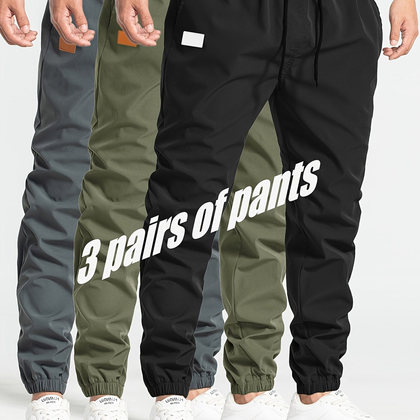 Three-pack of men's loose casual pants in 100% polyester solid color, featuring multi-pocket waist drawstring and non-stretch woven fabric, part of the Spring Collection, 180g/m².