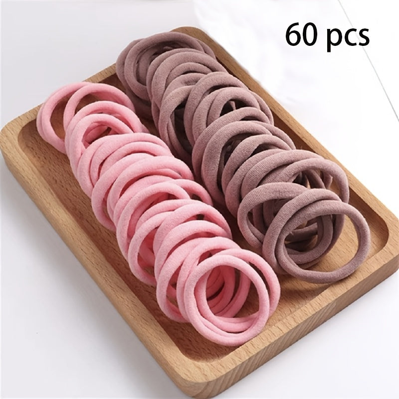 Solid color elastic hair rings in various quantities with anti-slip feature, suitable for daily use and holiday gifts.